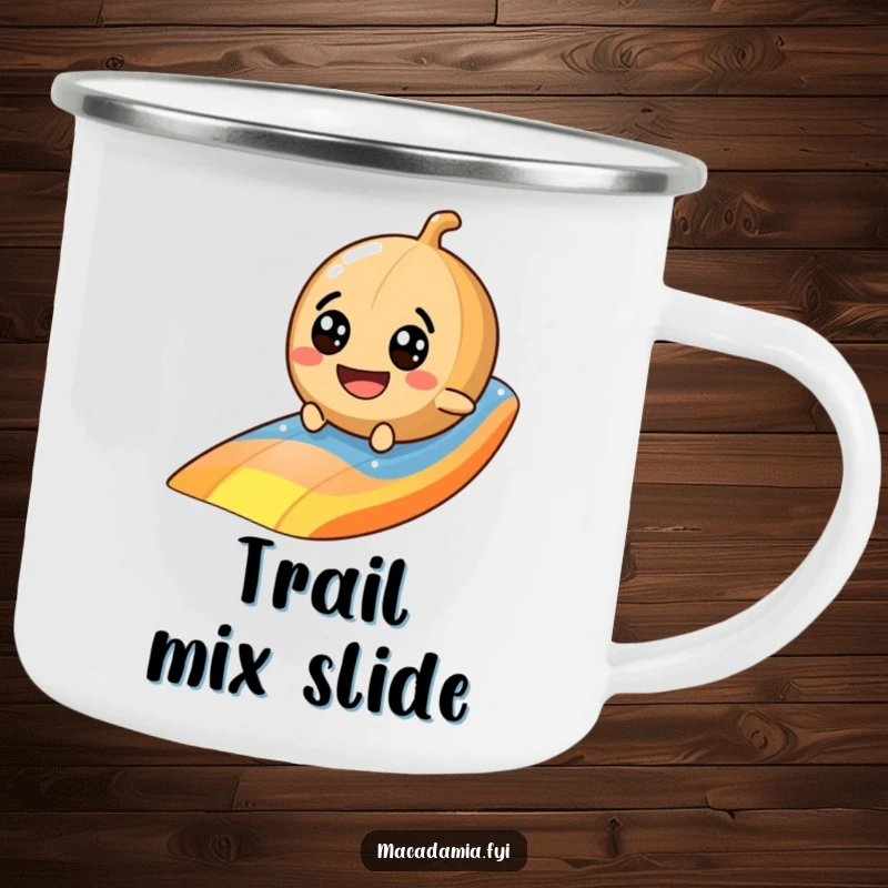 Funny macadamia nut camping mug showing a googly-eyed character sliding down a bright rainbow, perfect for campfire tales.