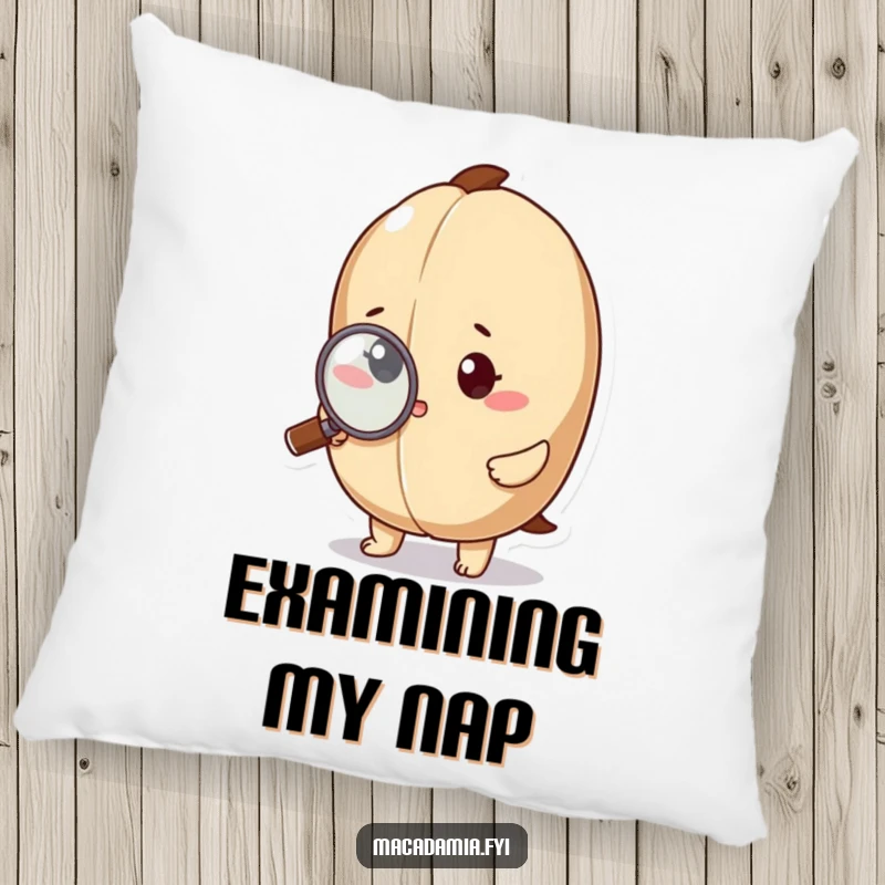 A macadamia nut character is using a magnifying glass to inspect a tiny detail on a soft pillow.