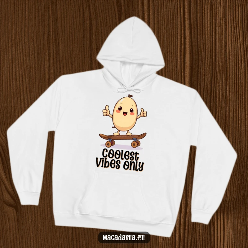 Funny hoodie with a kawaii macadamia nut giving a thumbs up while balancing on a skateboard, offering cozy comfort and cool, positive humor.