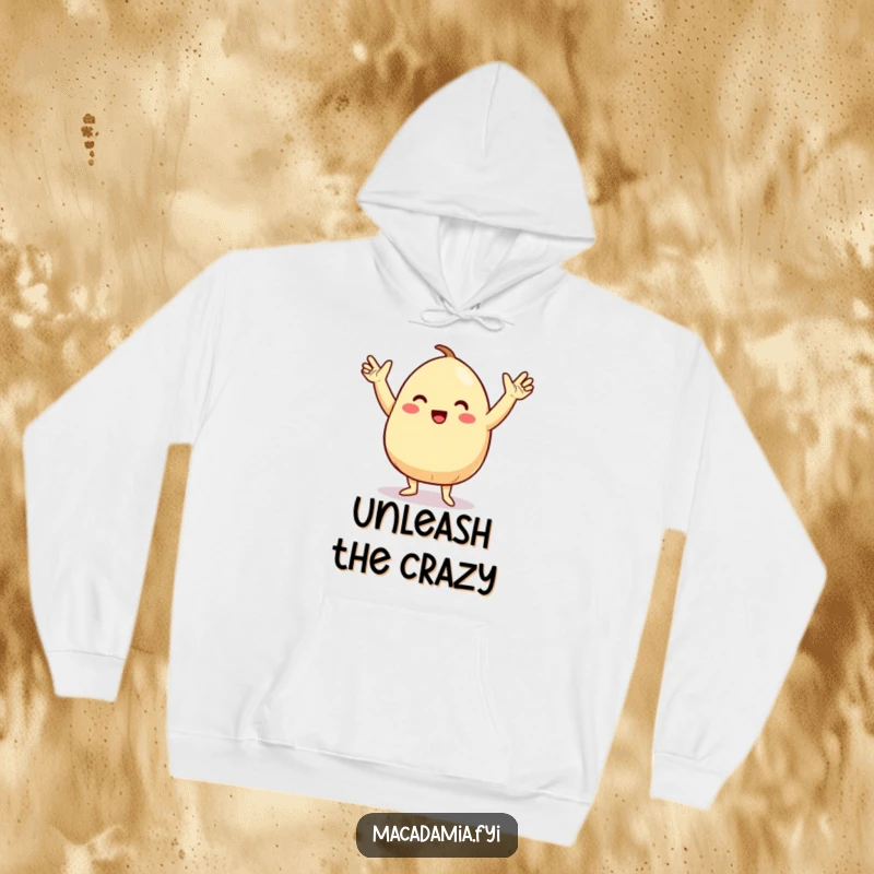 Funny hoodie with a macadamia nut character doing a silly, energetic dance with arms in the air, offering cozy fun vibes.