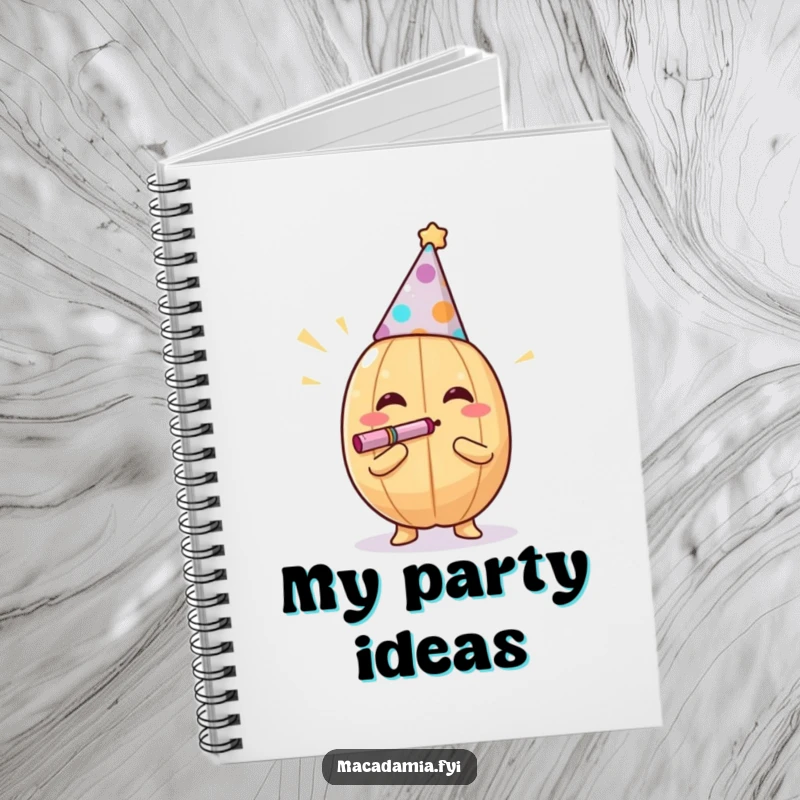 Funny macadamia nut with party hat on a notebook cover, ready for writing, a funny gift.