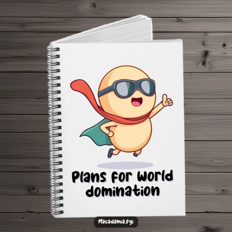 Funny macadamia nut superhero with a flying cape, adorning a notebook for jotting down heroic ideas.