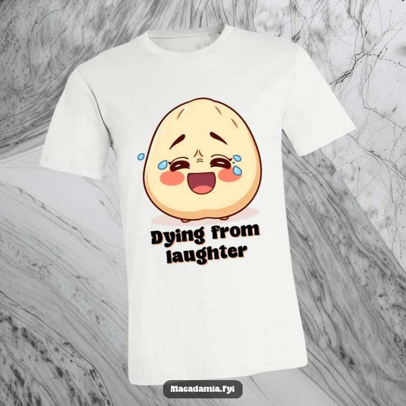 Funny t-shirt depicting a macadamia nut character in fits of uncontrollable laughter, with tears streaming from its joyful eyes.