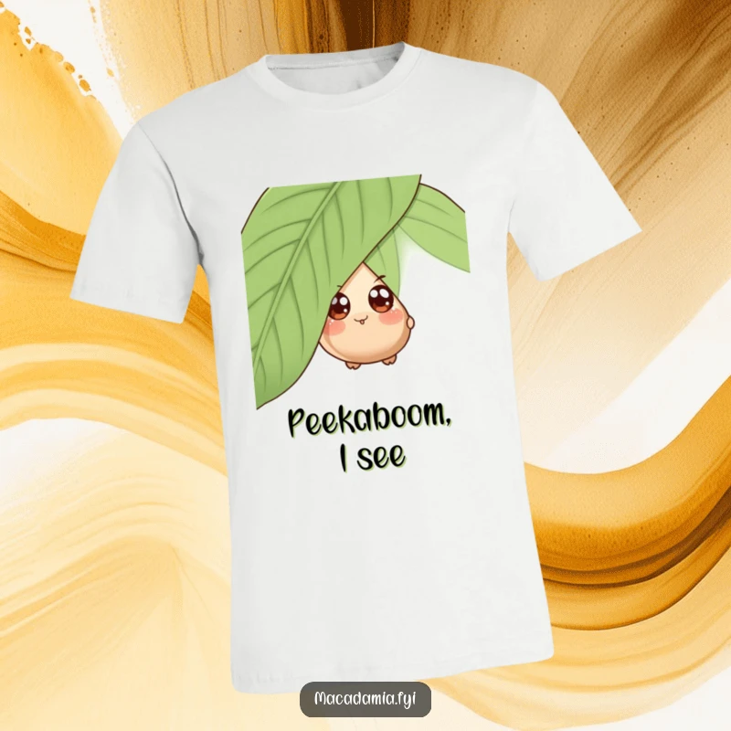 Funny t-shirt with a wide-eyed macadamia nut character playfully peeking from behind a giant leaf, inviting giggles.