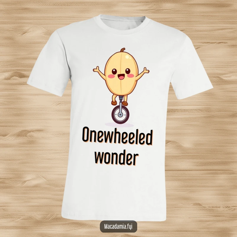 Funny t-shirt with a joyful macadamia nut riding a unicycle, arms outstretched, embodying balance, freedom, and humorous adventure.
