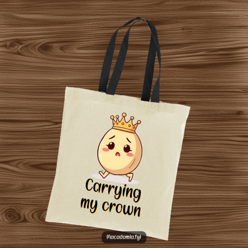 Funny macadamia nut tote bag showing a crowned character tripping unexpectedly, with a surprised and humorous expression.