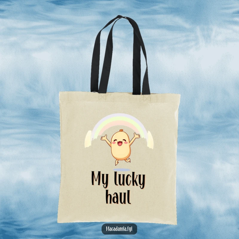 Funny macadamia nut tote bag with a joyful macadamia nut leaping towards a rainbow, perfect for carrying essentials with inspiration.