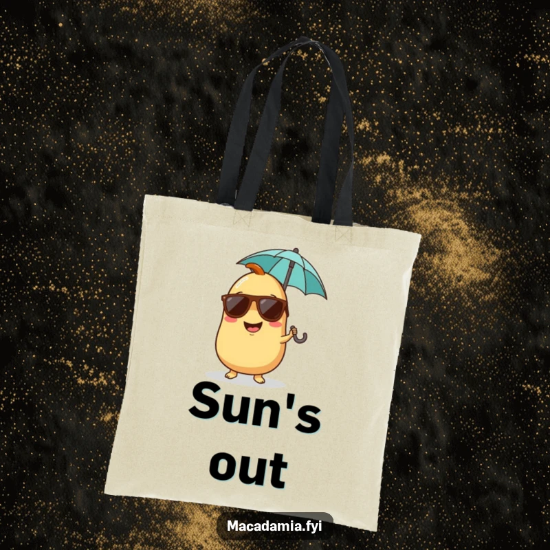 Funny tote bag with a giggling macadamia nut character wearing sunglasses and holding a tiny umbrella, ready for a good time.
